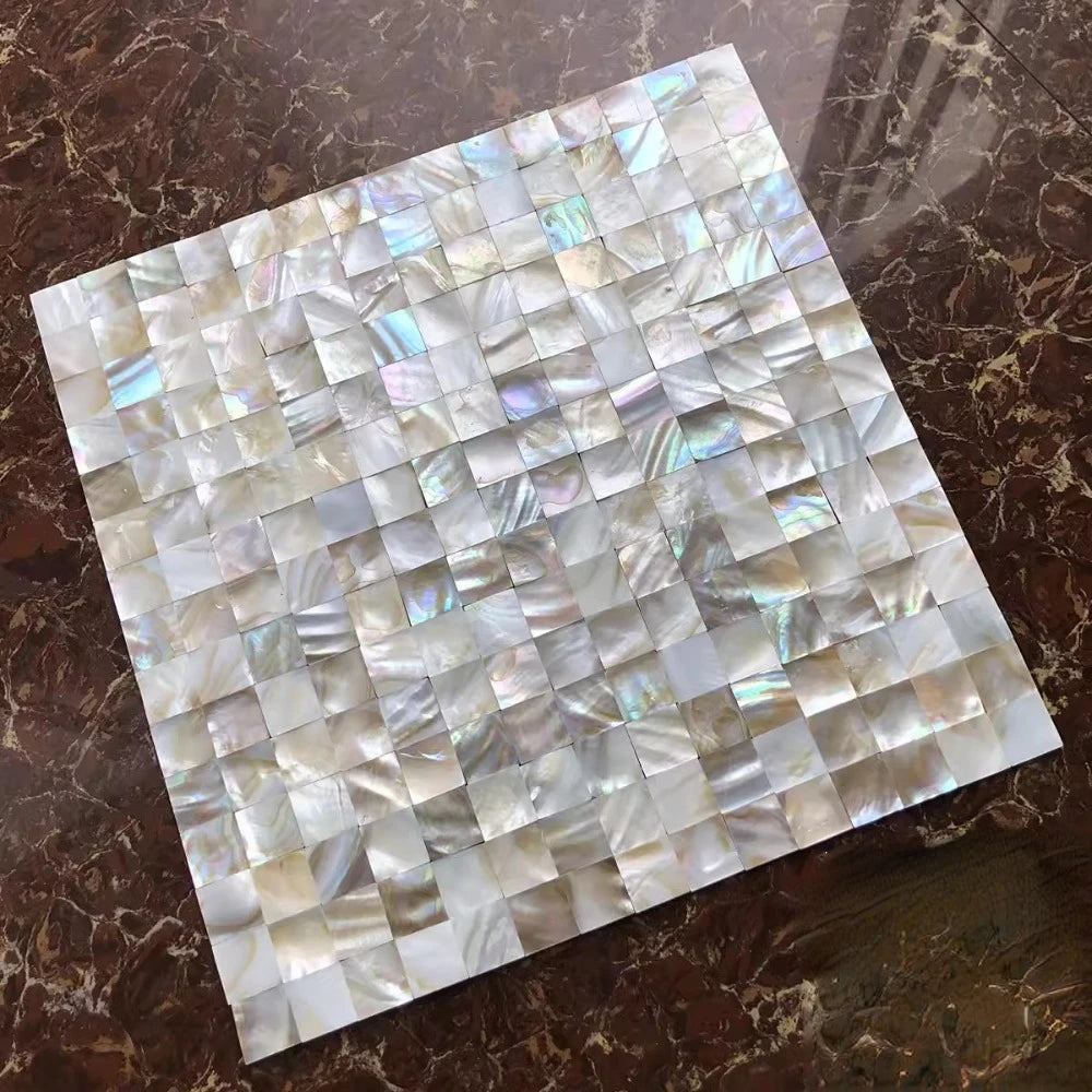 Mother of pearl shell mosaic tile sheet with square white and iridescent blue pieces
