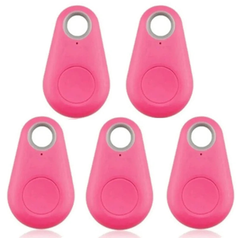Five pink mini Bluetooth GPS trackers for dog collars, keys, and bags. Wireless smart tag for easy pet locating.