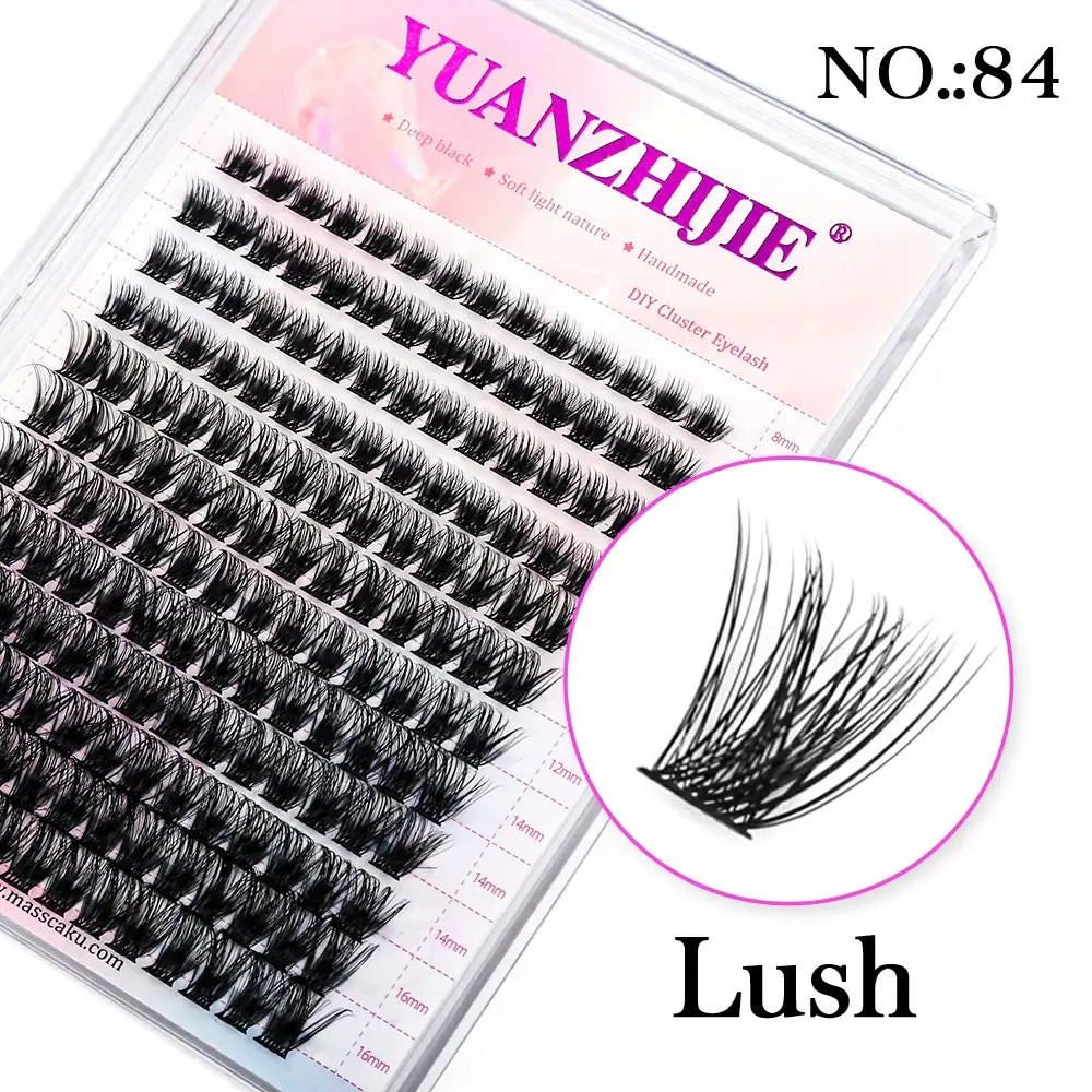 Clear plastic case of 144 black, segmented DIY mink cluster lashes in varying lengths with a close-up circle.