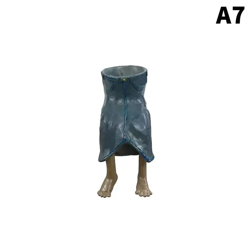 Teal-blue leggy resin planter with draped sides and standing gray legs