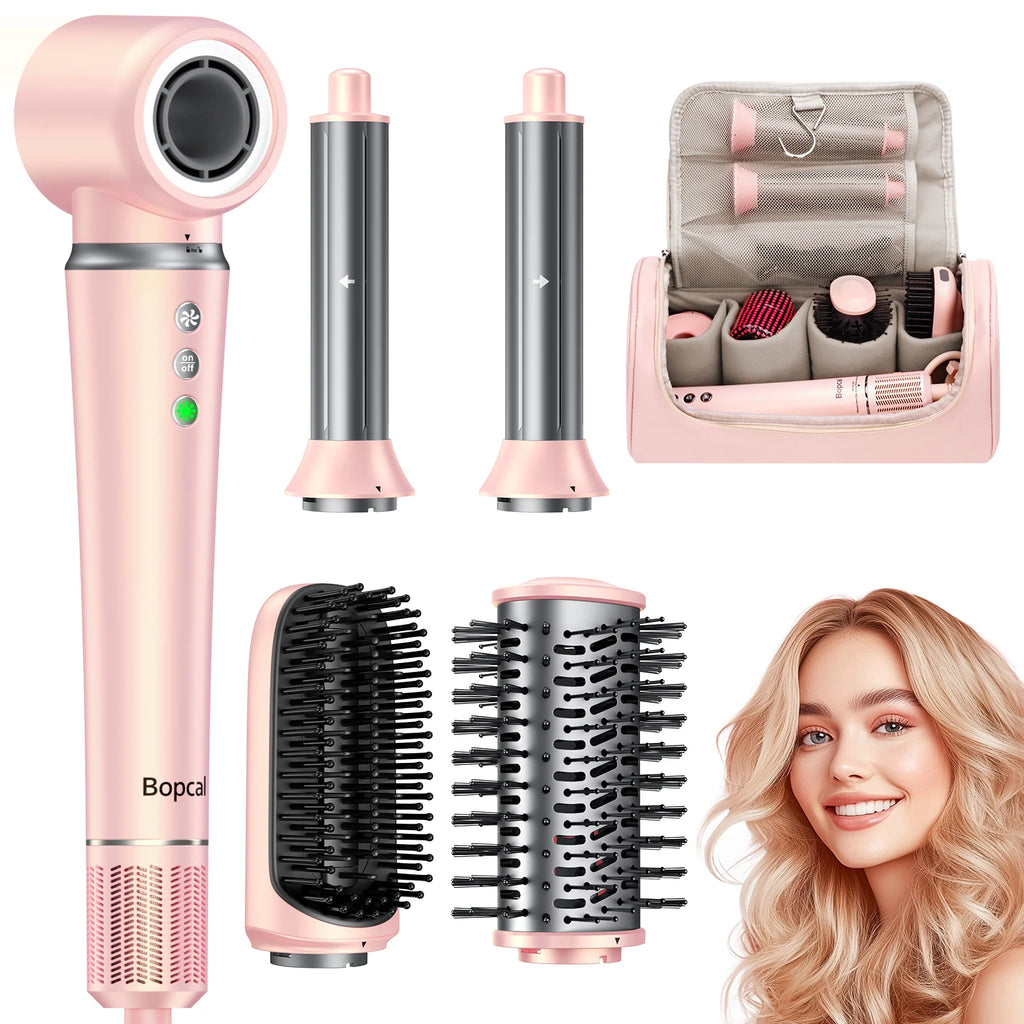 Pink 5-in-1 hot air styler set with dryer, auto-curlers, brush heads, and travel bag for professional hair styling.