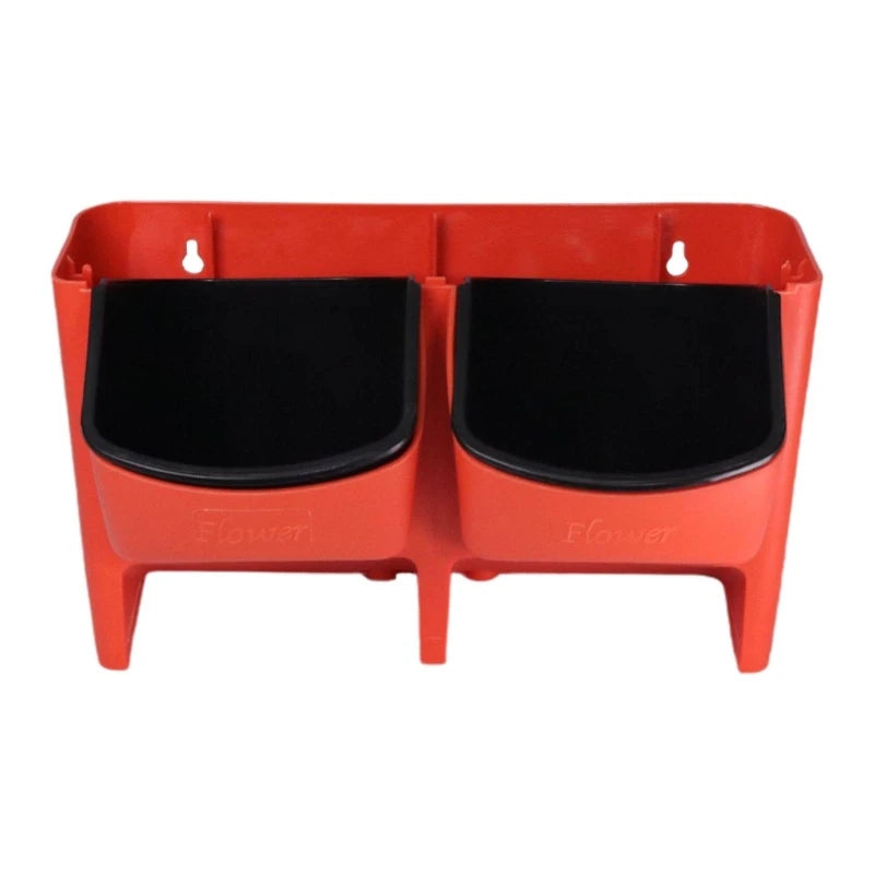 Red double-pocket hanging wall planter with two black cup inserts.
