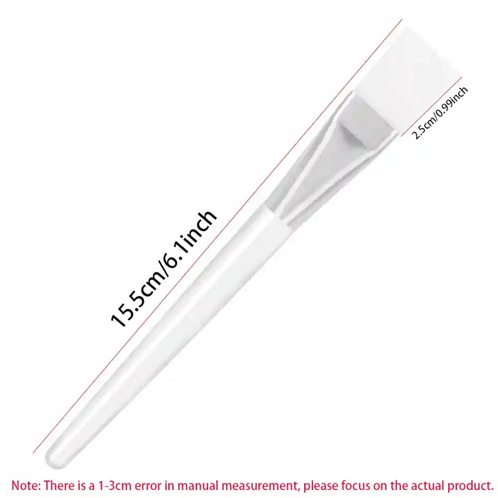 A white facial mask applicator brush with a transparent handle and silver ferrule, showing 15.5cm total length.