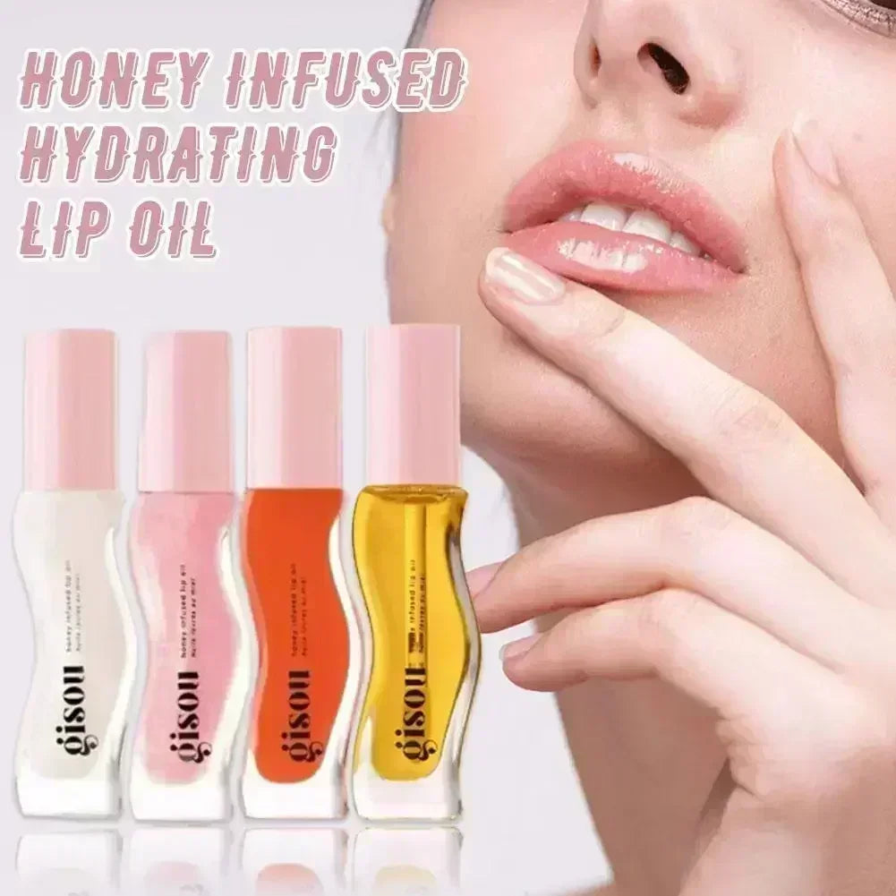 Gisou honey-infused hydrating lip oils in colorful glass tubes for glossy, moisturizing, line-reducing lip makeup.