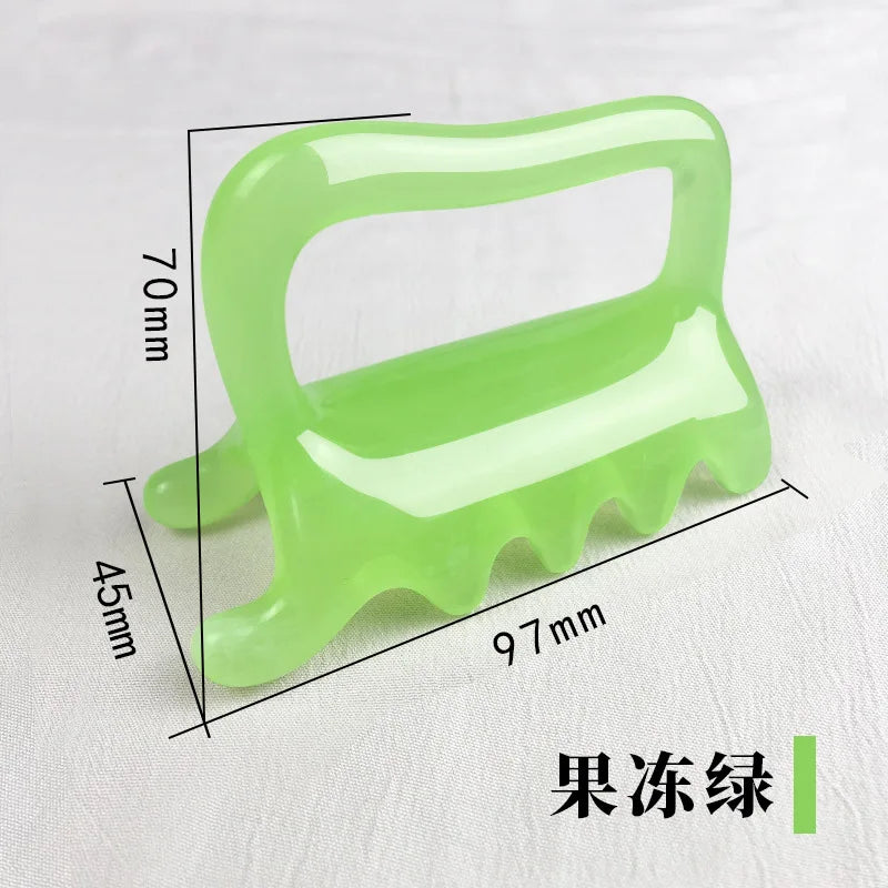 Light green translucent massage tool with handle and four teeth, 97x70x45mm, for scalp and body fascia massage.