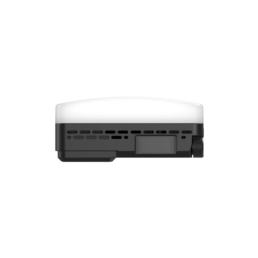Small rectangular LED video light with a white diffuser, black housing, side control dial, and display screen.