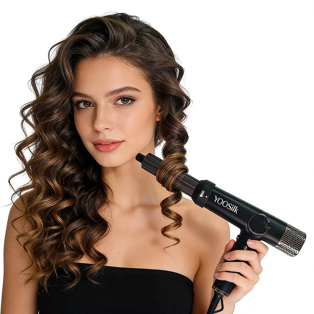 Woman using black 1800W 5-in-1 professional airwrap styler to create salon-quality curls with negative ion technology.
