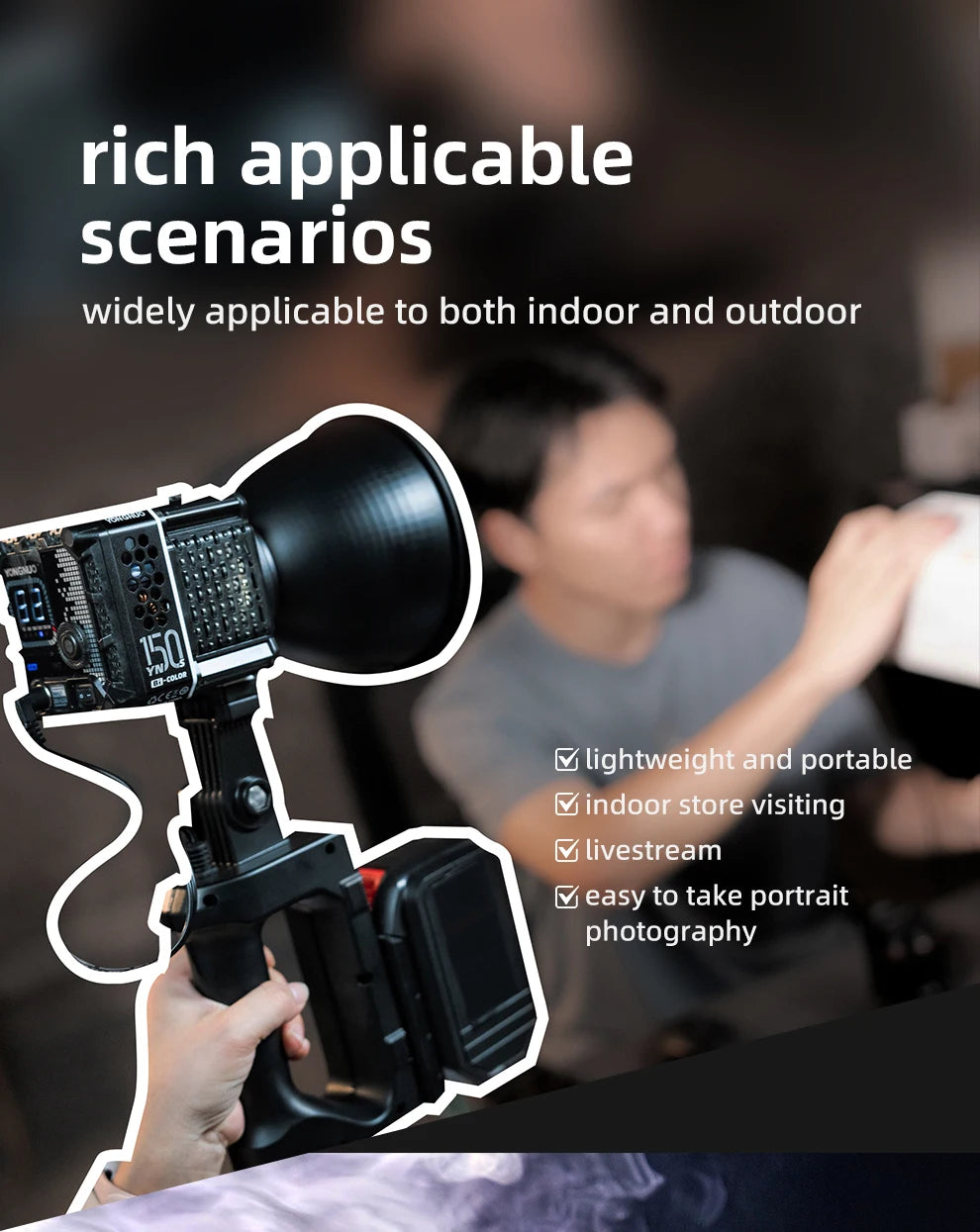 Handheld black LED video light with a conical reflector, side handle, and battery pack for photography and