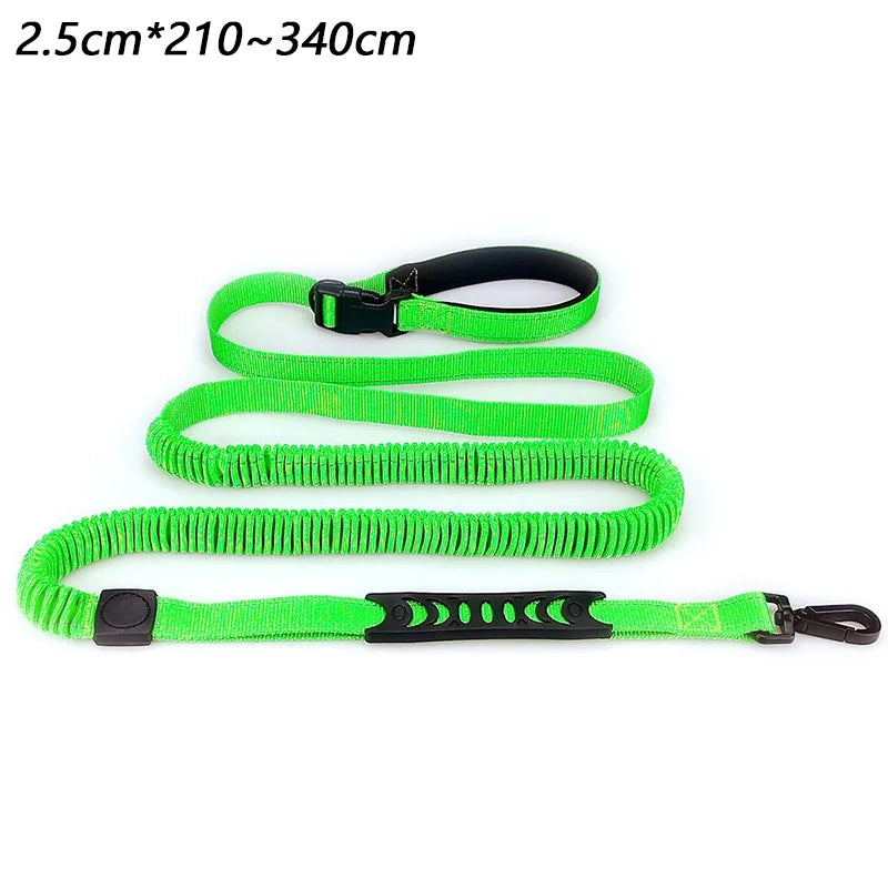Tidesmit bright green bungee dog leash with a padded handle, secondary control grip, and black metal hardware.