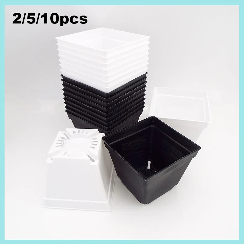 Mini square planter pots in white and black stacks with matching base inserts