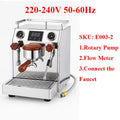 Stainless steel professional espresso machine with wood handle, rotary pump, flow meter, and dual pressure gauges.