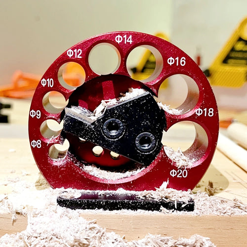 Wood dowel maker jig kit close-up, red 8-hole guide with black carbide blade set