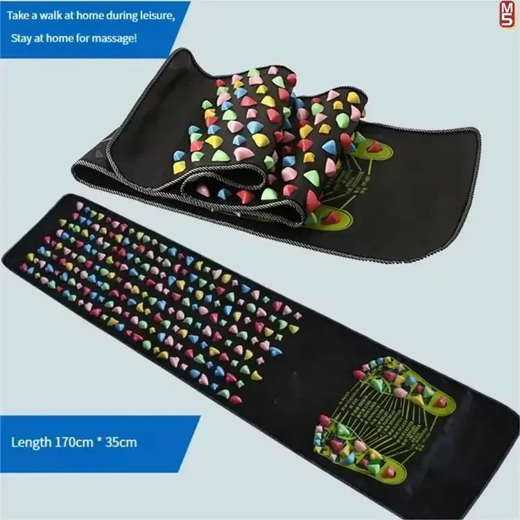 Black foot reflexology acupressure massage mat with colorful plastic stones for home foot therapy and walking exercise.