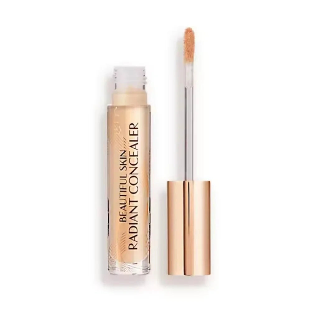 Charlotte Tilbury Beautiful Skin Radiant Concealer with doe-foot applicator in a clear glass tube with gold cap.