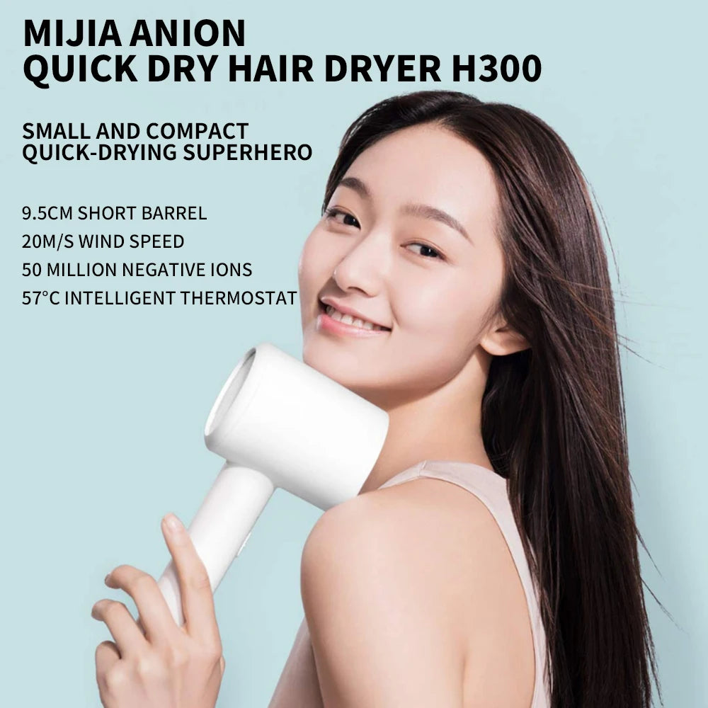 Xiaomi Mijia H300 white ionic hair dryer featuring a compact short barrel design for quick professional home drying.
