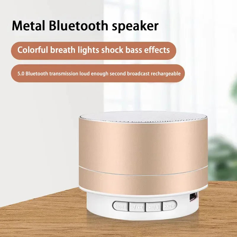 Portable Bluetooth speaker with light beige metal body and white control base