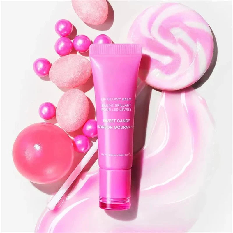 Laneige Lip Glowy Balm in Sweet Candy: a glossy, moisturizing pink lip serum tube with candy-themed decor.