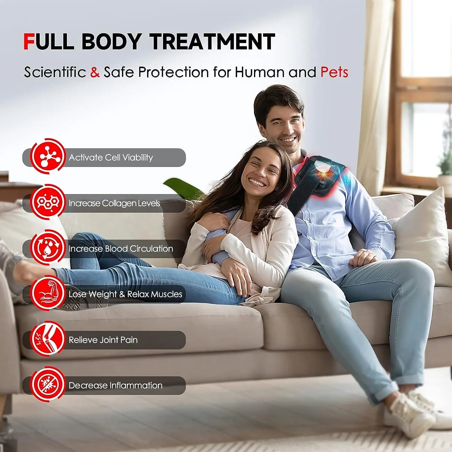 A couple sits on a couch while the man wears a black red and infrared LED light therapy wrap on his shoulder.