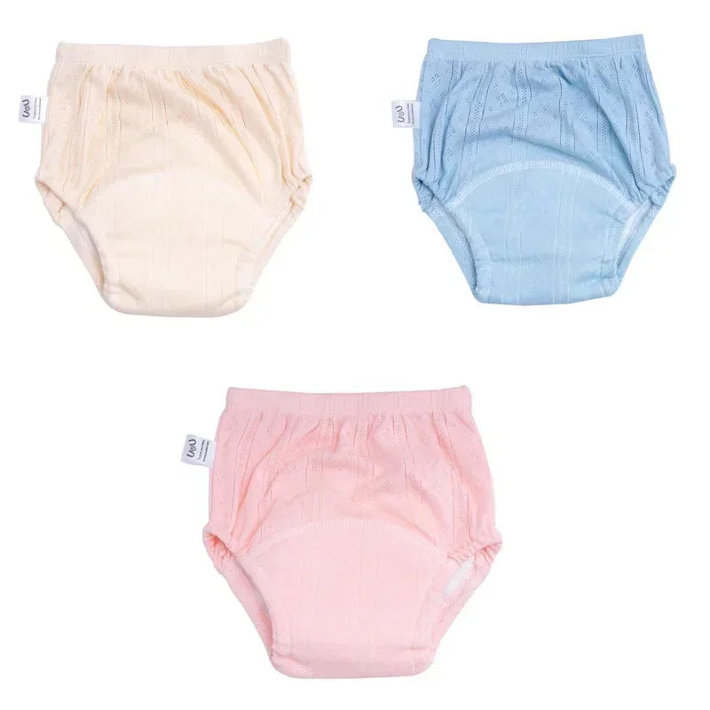 U&U baby potty training pants 3-pack in cream, blue, and pink. Reusable cotton absorbent baby care underwear.