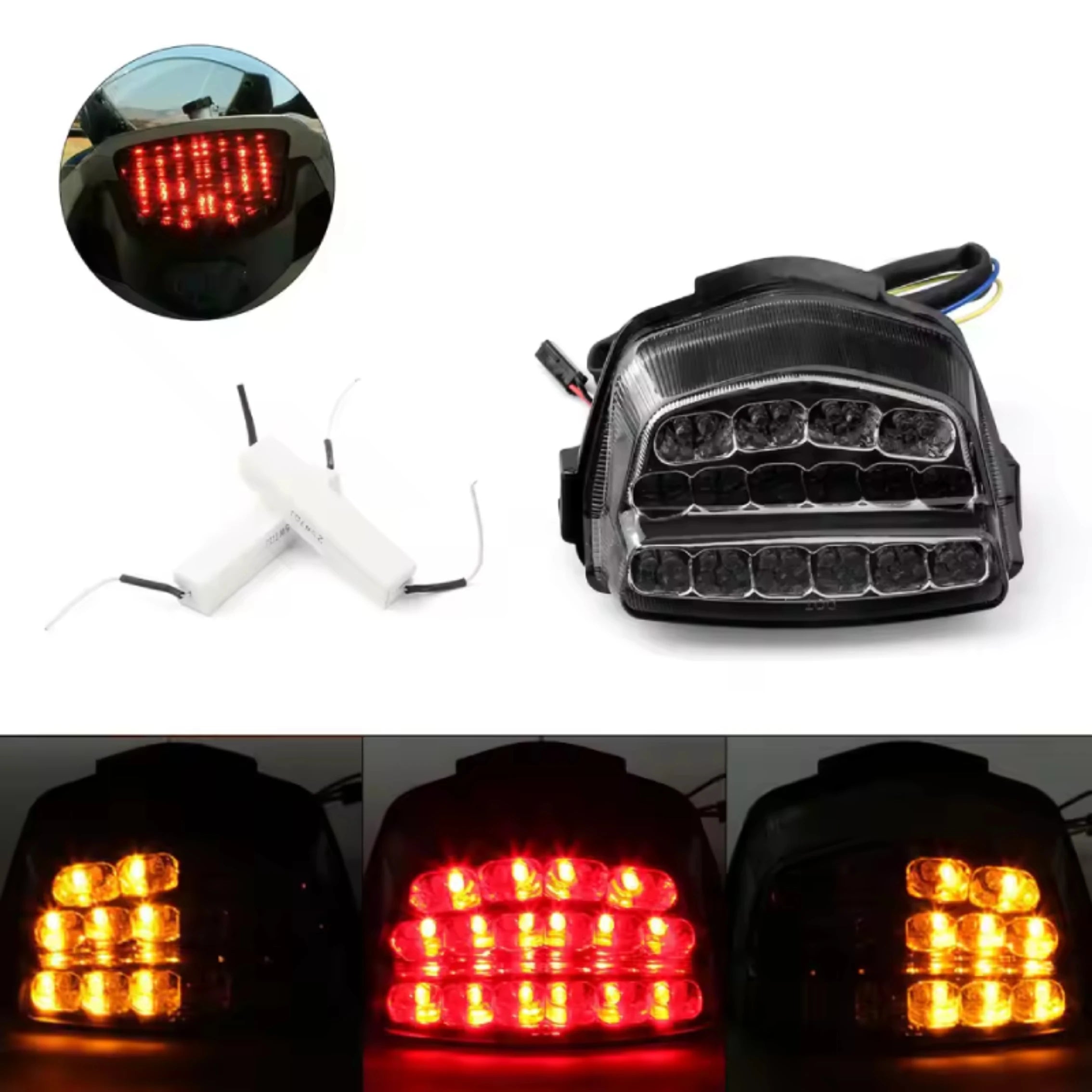 Smoke-lens integrated LED tail/turn signal light showing amber LED illumination