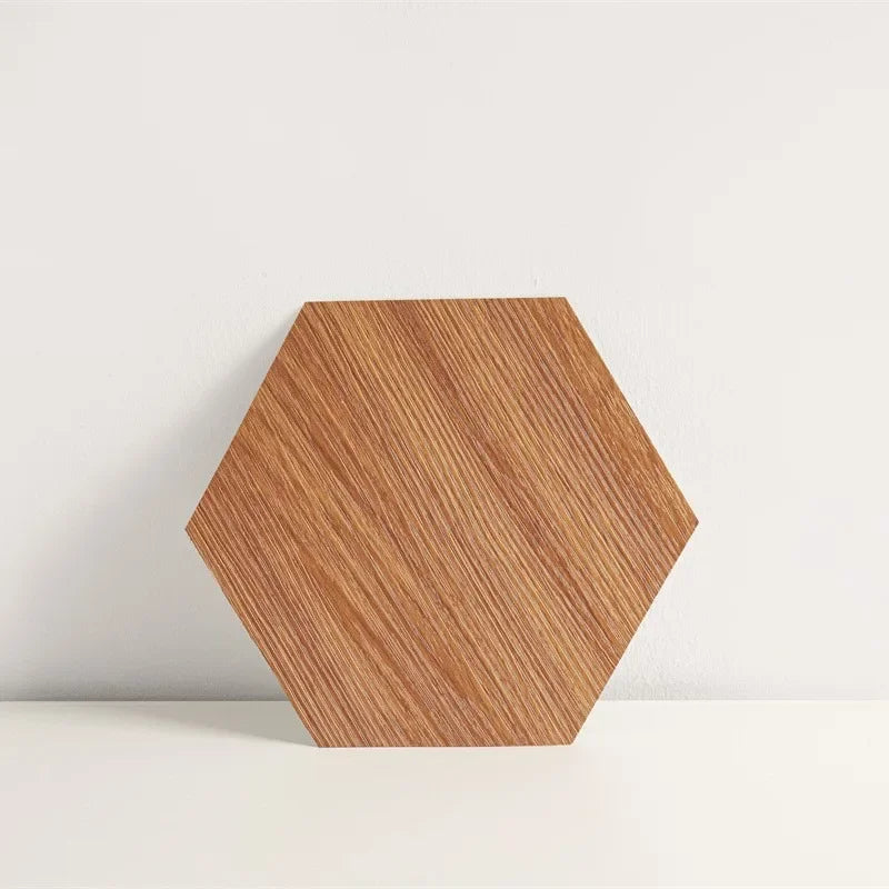 Hexagon wood-grain vinyl peel-and-stick floor tile, warm brown with linear streaks