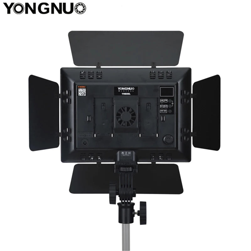 YN600L rectangular black LED video light with four adjustable barndoors, cooling fan, and stand mount.
