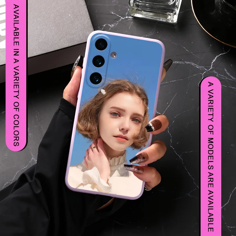 Light purple phone case with a photo of a woman on the back, held in a hand.