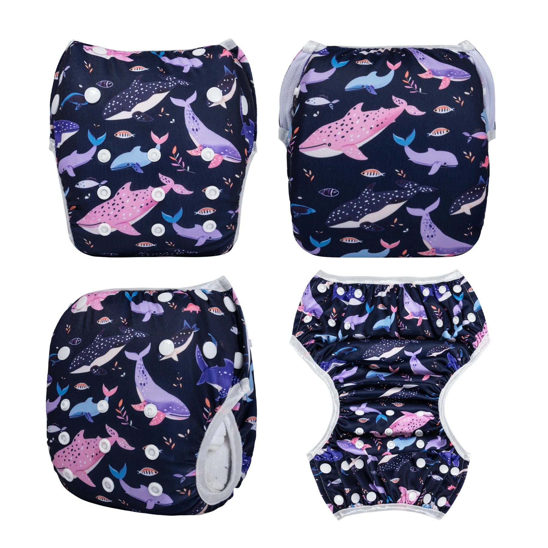 Reusable baby cloth diaper in a navy blue whale print design with adjustable snap closures.
