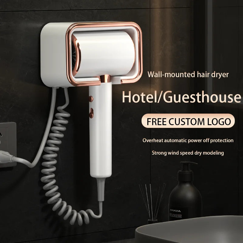 White and rose gold wall-mounted hotel hair dryer with coiled cord, high-power motor, and sleek no-drill design.