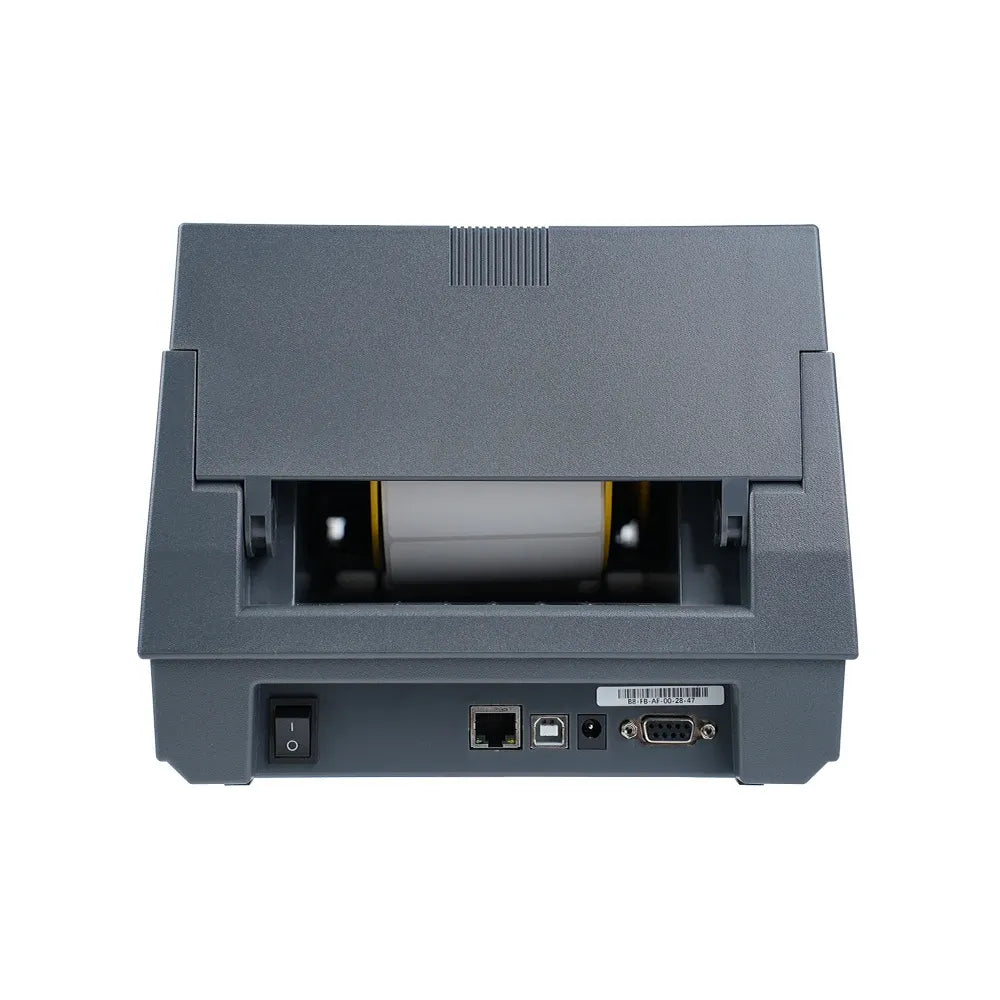 Gray desktop label printer with open cover and visible internal ribbon roller
