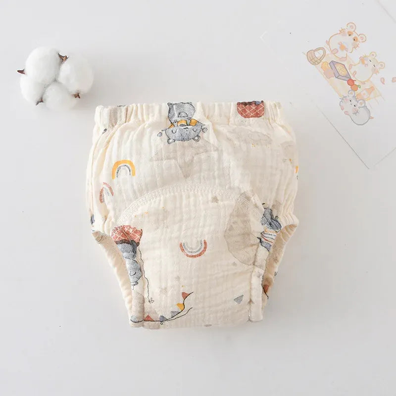 Reusable cotton baby diaper with cute bear and rainbow print for comfortable infant care.