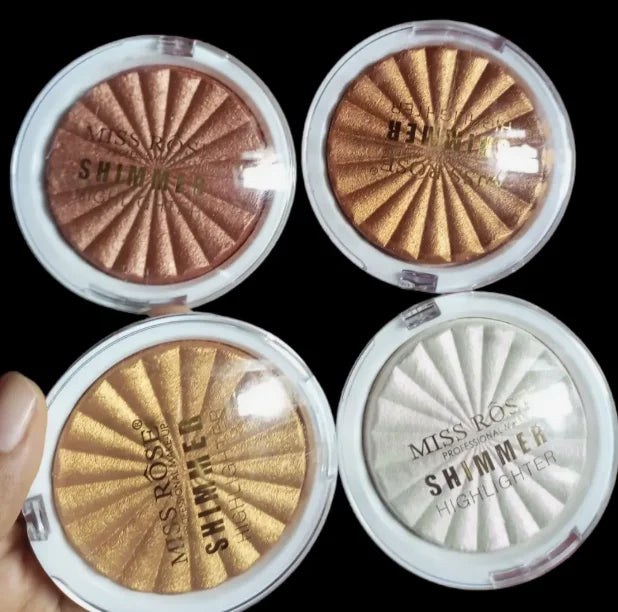 Tidesmit 3D pearlescent shimmer highlighter powder texture close-up for radiant face makeup glow