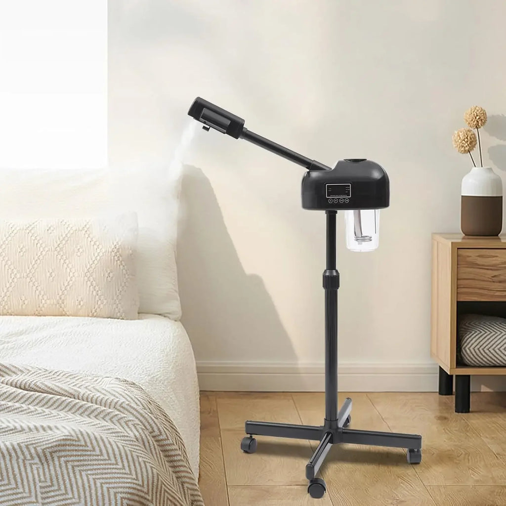 Black portable facial steamer with LCD screen, height-adjustable stand, and wheels in a home bedroom setting.