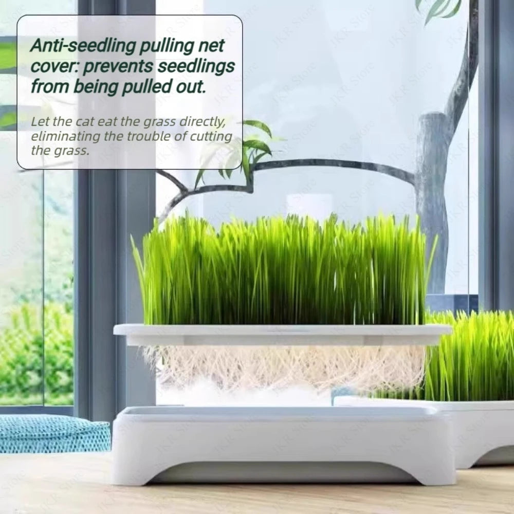 White hydroponic planter box with green grass and protective net cover