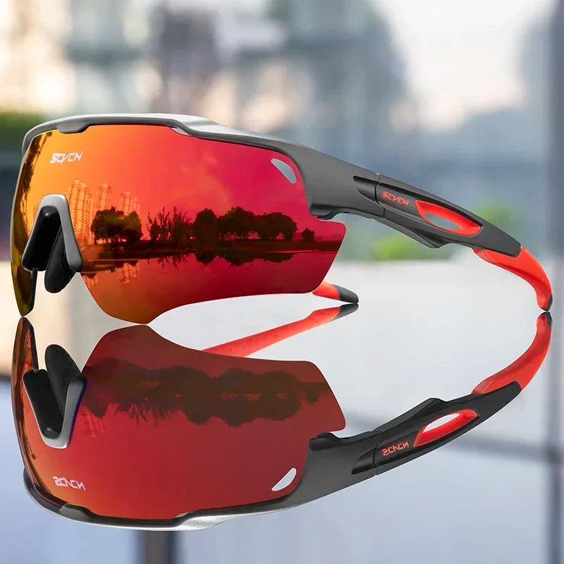 Cycling sunglasses with red reflective lens and dark gray frame, wraparound fit