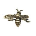 Solid brass bee tea pet figurine, golden metal sculpture for desk decor and collectible tabletop ornament.