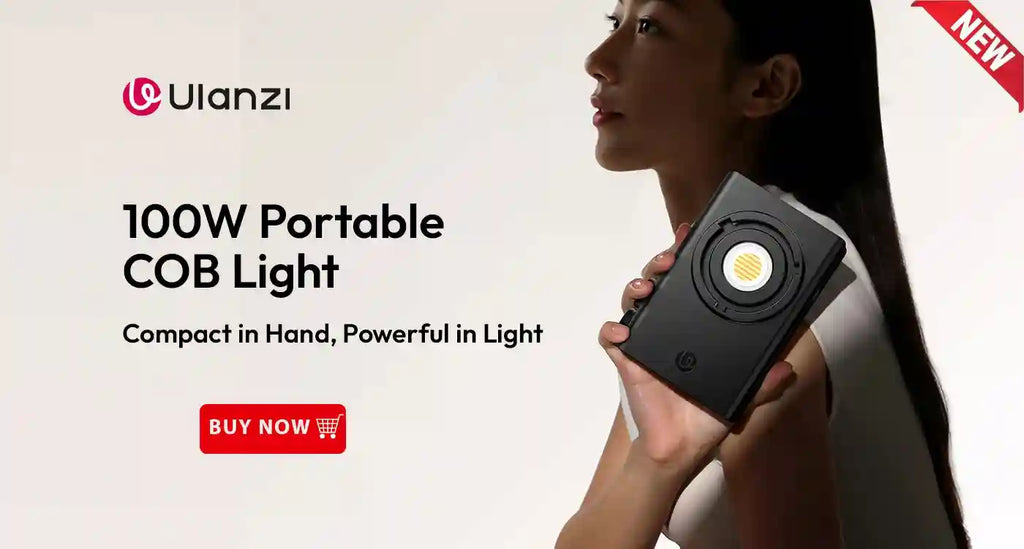100W portable black COB video light, rectangular shape, held in hand, used for photography and videography lighting.