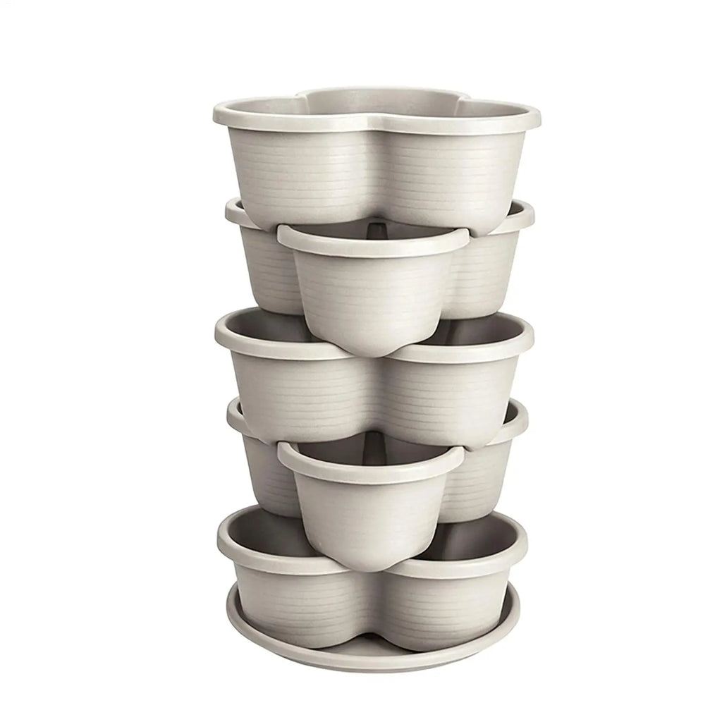 White vertical stackable butterfly planter pot tower with three tiers and nested cups