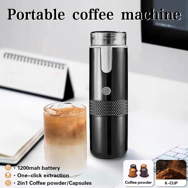 Black portable electric coffee maker for powder and capsules with 1200mAh battery on an office desk.