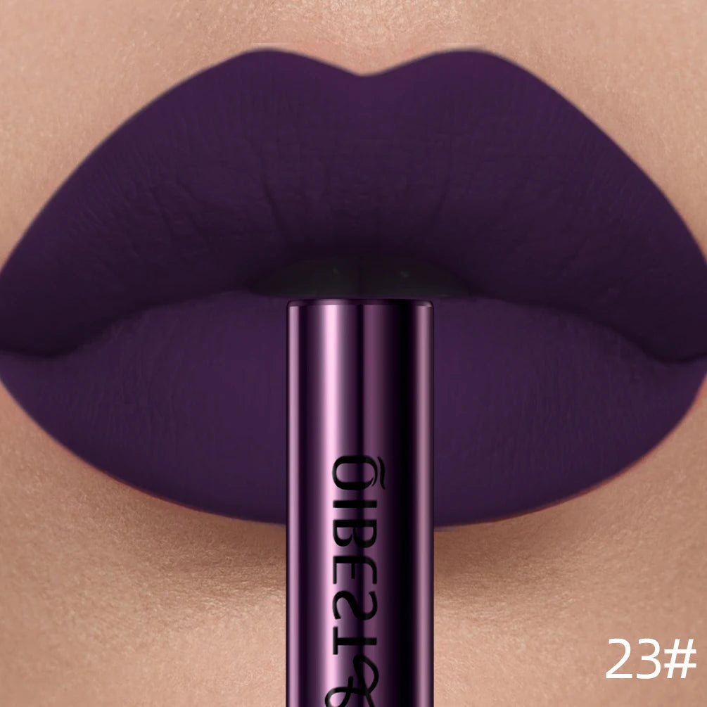 QIBEST dark purple velvet matte liquid lipstick on lips for a long-lasting, nonstick, professional makeup finish.