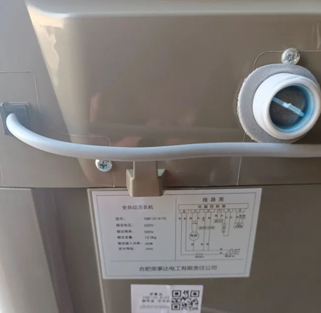 Tidesmit 12kg fully automatic wave wheel washing machine with blue light anti-winding feature, side angle view.