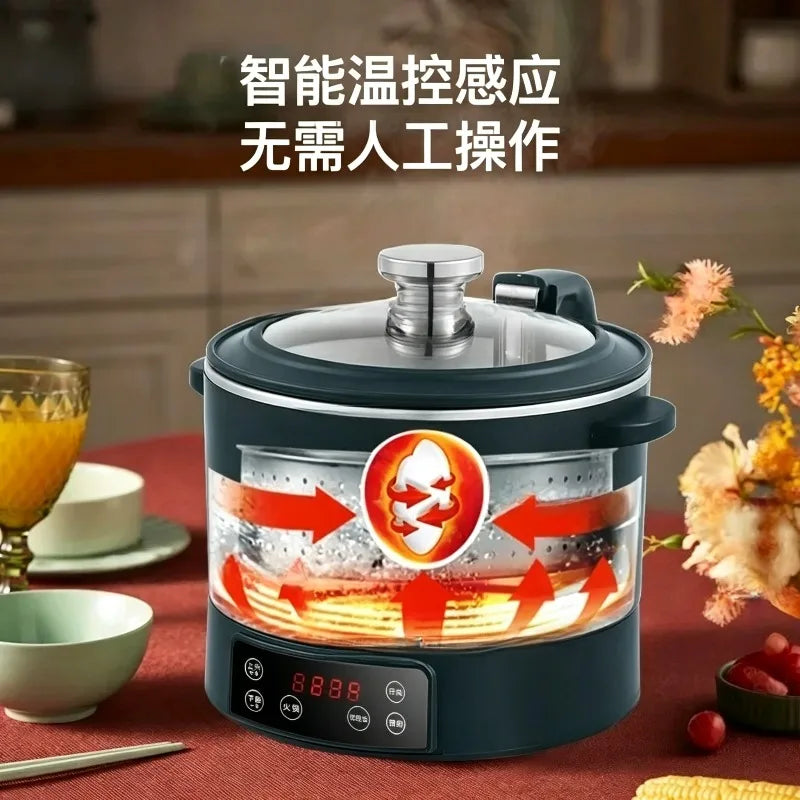 Dark green electric rice cooker with stainless lid and illuminated digital display