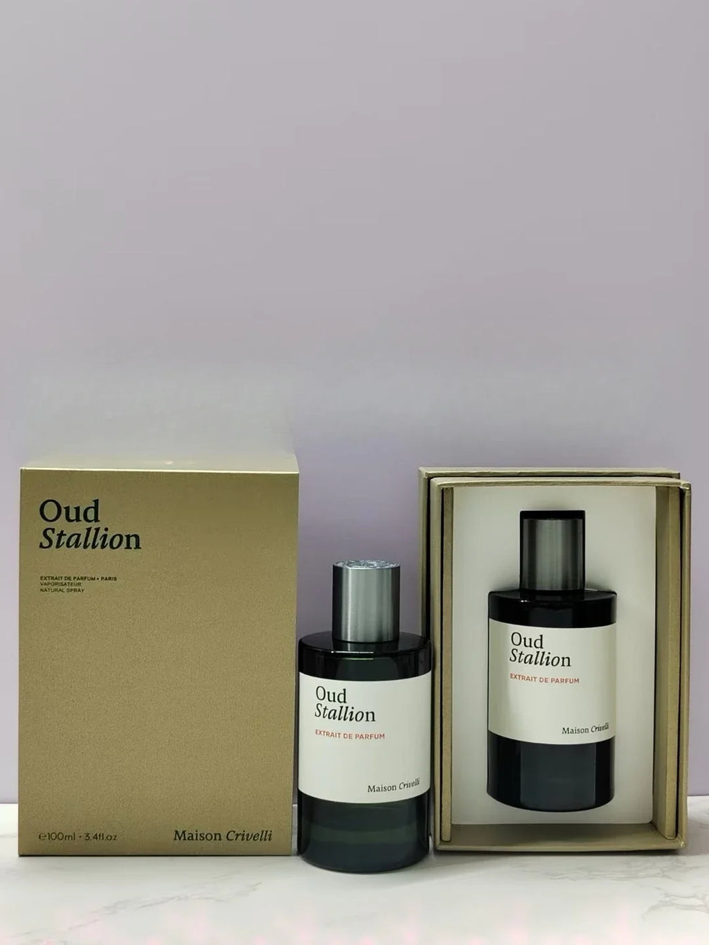 Maison Crivelli Oud Stallion unisex Extrait de Parfum. 100ml luxury oud fragrance in a sleek cylindrical glass bottle.