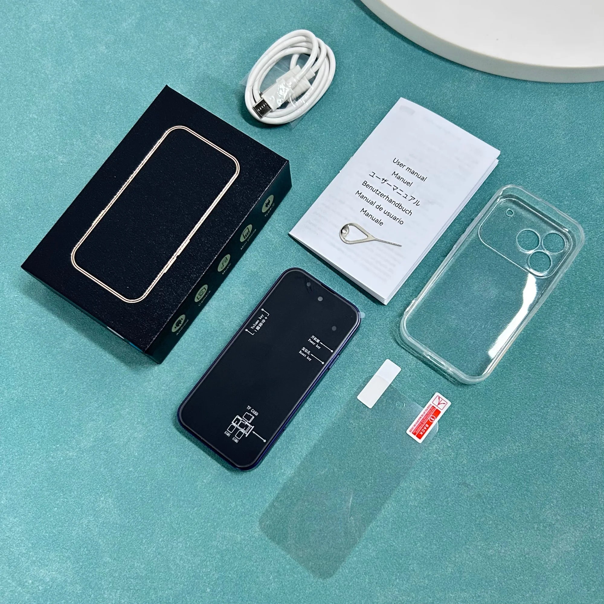 ONEMYTH A18 Pro 4-inch 4G mini smartphone set with box, manual, case, and cable on teal background.