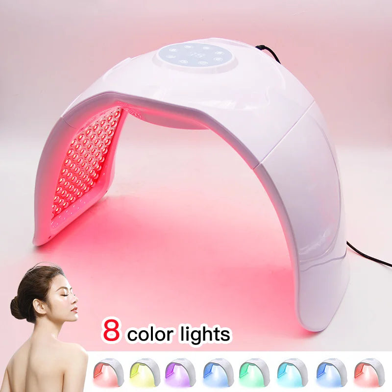 White 8-color LED light therapy arch for facial rejuvenation and home skin care with digital control panel.