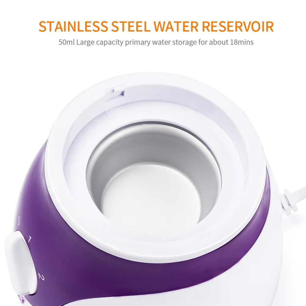 White and purple face steamer with 50ml stainless steel water reservoir for home spa skin moisturizing and pore care.