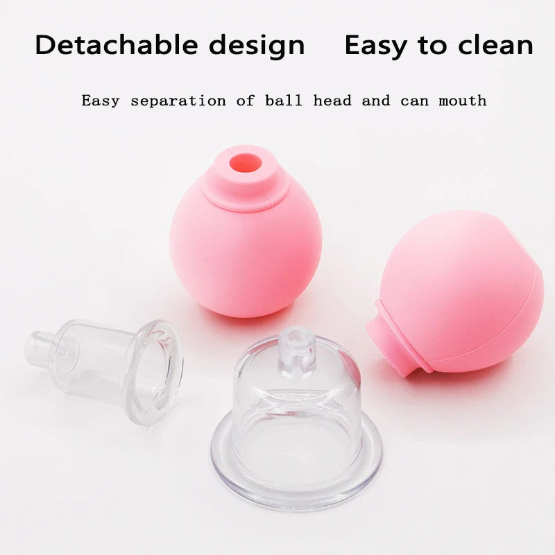 Two pink silicone squeeze bulbs and two clear plastic suction cups for facial cupping therapy on a white background.
