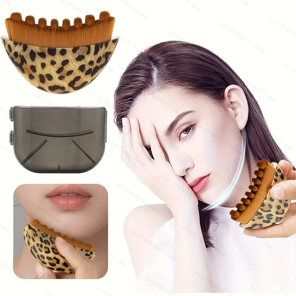 Leopard print curved facial massage brush with brown bristles, shown with a clear protective cover and in use on a jaw.