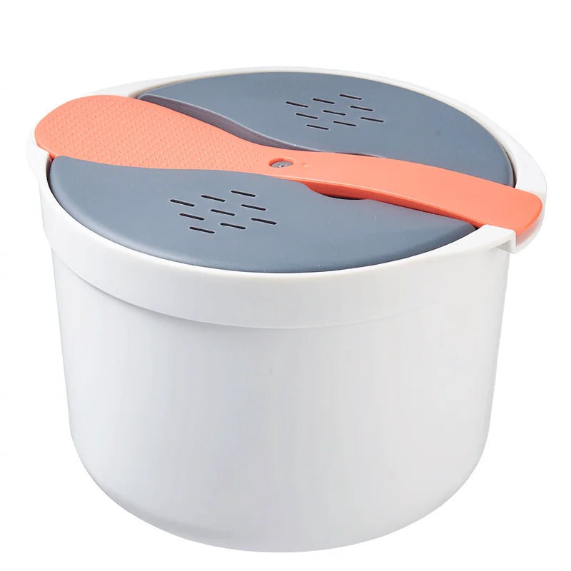 Microwave rice steamer pot with white body and orange-gray lid with steam holes.