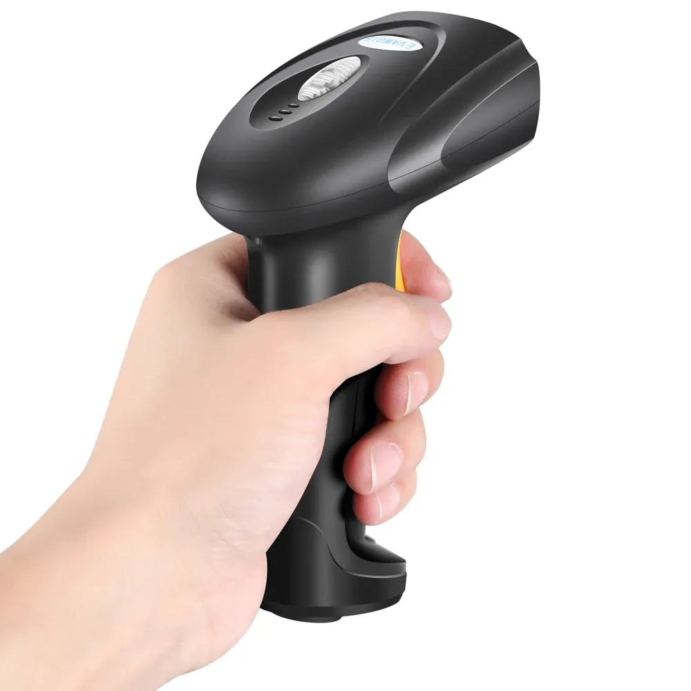 Handheld black-and-orange barcode scanner held in hand with trigger-style grip